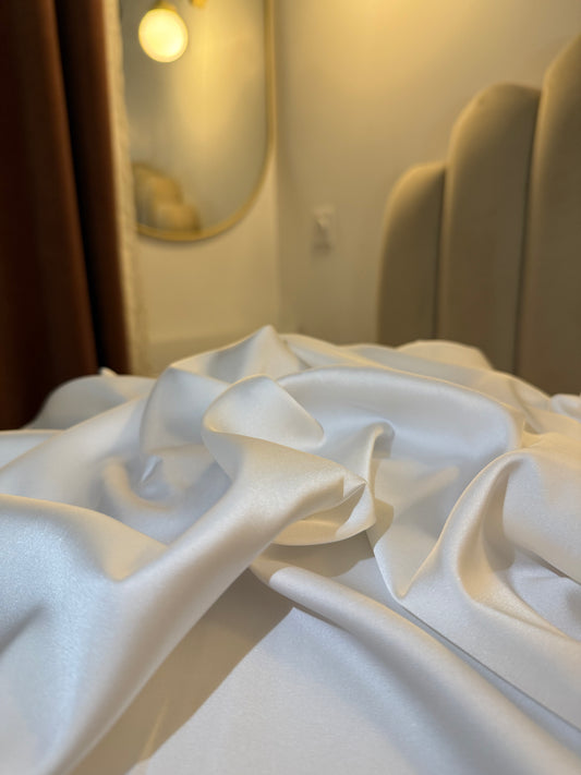 Taie d'oreiller en soie blanche