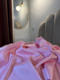 Taie d'oreiller en soie rose